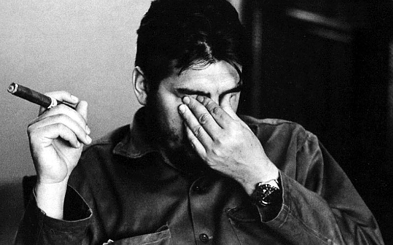That photo of Che Guevara pinching his nose with a fat cig in his other hand